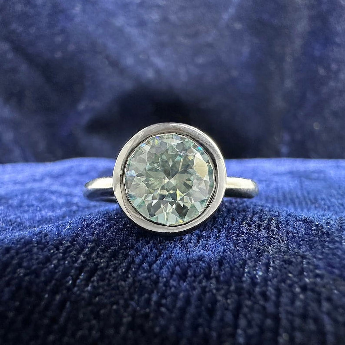 Solitaire Ring With Round Ice Blue Moissanite Diamond Bezel Set In Silver/Gold G514